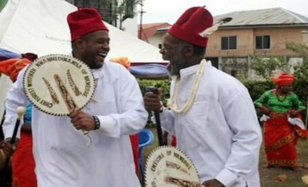 Traditionally titled Igbo men laughing